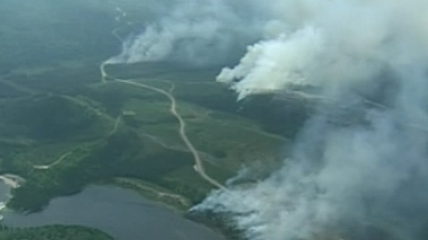 More than a dozen forest fires were burning out of control in central Quebec on Thursday, May 27, 2010.