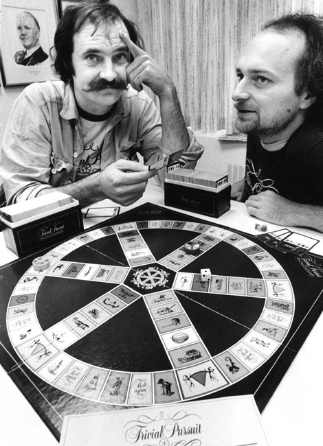 Chris Haney (left) and Scott Abbott play Trivial Pursuit, the successful board game they invented. (THE CANADIAN PRESS)