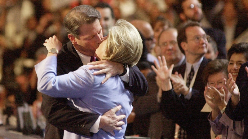 In this Aug. 17, 2000, file photo, Democratic presidential nominee Al Gore kisses his wife, Tipper on the stage at the Democratic National Convention at the Staples Center in Los Angeles. (AP Photo/ David J. Phillip)