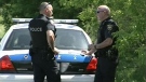 Police attend a crime scene at Walkley Yard, as they search for evidence in a murder case, Wednesday, June 2, 2010.