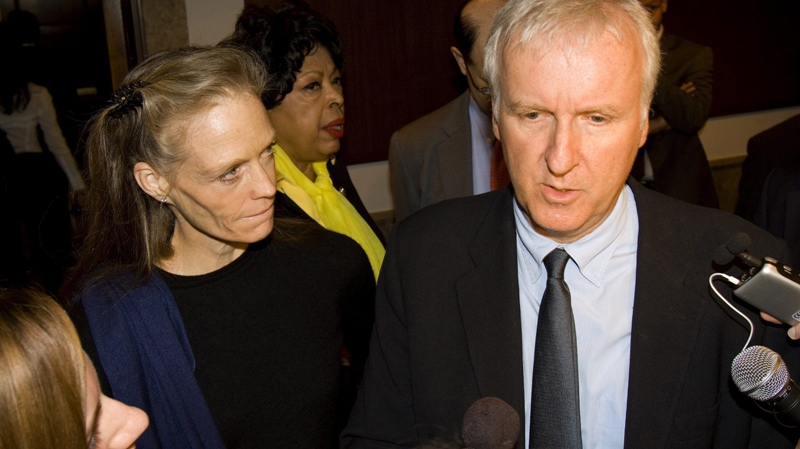 James Cameron and his wife Suzy Amis Cameron are interviewed at a global environmental policy conference on Capitol Hill in Washington, April 15, 2010. (AP / Harry Hamburg)