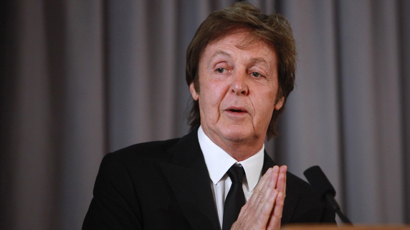 Singer Paul McCartney speaks to the media about his Library of Congress Gershwin Prize for Popular Song in Washington, on Tuesday, June 1, 2010. (AP Photo/Jacquelyn Martin)