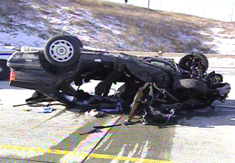 Police investigate the scene of the fatal car crash on Hwy. 407 near Dixie Rd. on Tuesday, Dec. 4, 2007.
