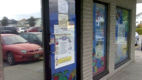 Paintings cover the windows of the Little Angels Montessori Academy in Barrhaven, located on Cedarview Road. (Facebook)