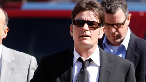 Charlie Sheen enters Pitkin County Courthouse in Aspen, Colo. to attend a hearing on domestic violence charges on March 15, 2010. (AP / David Zalubowski)