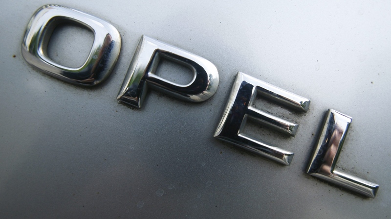 The letters of General Motors Co.'s Opel unit photographed on a car in Berlin, on Wednesday, June 9, 2010. (AP Photo/Markus Schreiber)