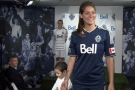 Whitecaps captain Martin Nash and women's team striker Kara Lang modelled Whitecaps FC the new 2011 MLS jerseys on June 10, at Bell's offices when Bell was announced as the team's offical sponsor. CTV 