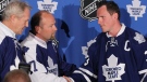 Newly-announced Toronto Maple Leafs captain Dion Phaneuf is congratulated by former Maple Leafs captains Darryl Sittler and Wendel Clark during a press conference in Toronto, Monday, June 14, 2010. (Darren Calabrese / THE CANADIAN PRESS)  