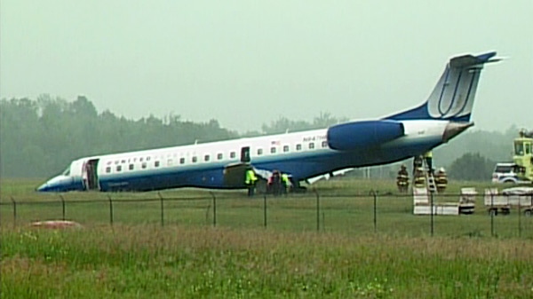 A United Express plane is seen after it slid off the runway at Ottawa's Macdonald-Cartier International Airport Wednesday afternoon, June 16, 2010.