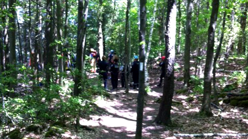 Crews arrive at Mount Nemo Conservation Area after two people became trapped on a rocky cliff, Wednesday, May 16, 2012.