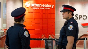 Police investigate after a man was shot and killed inside the Eaton Centre on Saturday June 2, 2012. (THE CANADIAN PRESS)