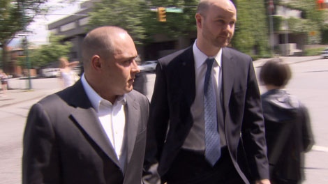 Paul Antunes, left, leaves a Vancouver court after he was convicted on six counts in the 2005 hit-and-run that killed two pedestrians. June 18, 2010. (CTV)