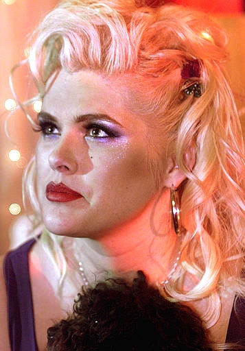 Former model Anna Nicole Smith poses in this July 9, 2002 file photo. (AP / Damian Dovarganes)