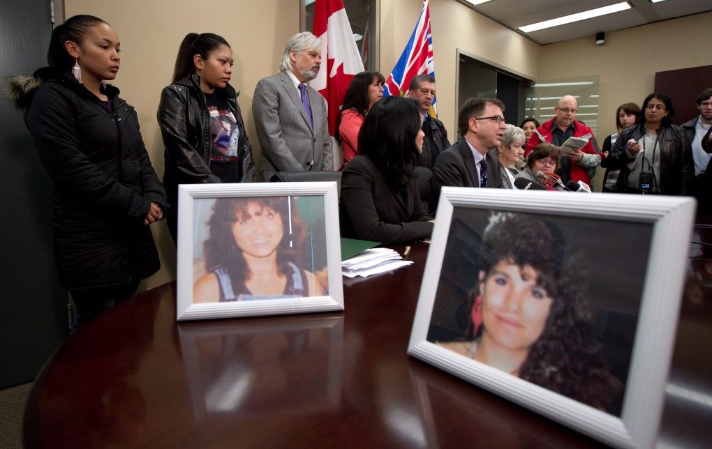 Photos of serial killer Robert Pickton victims Diane Rock, left, and Cara Ellis are displayed