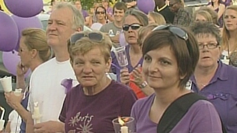 Woodstock, Ont. residents attend candlelight vigil that was held in memory of Tori Stafford, Saturday, May 19, 2012.