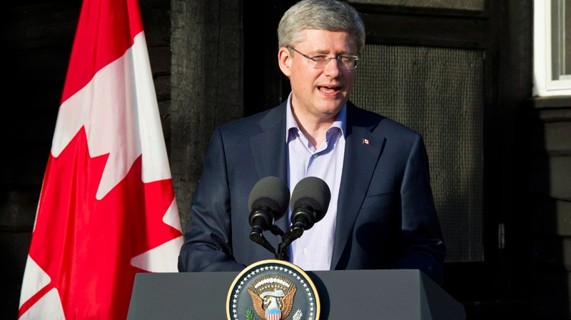 Prime Minister Stephen Harper delivers closing remarks at the G8 summit in Camp David, Md.,