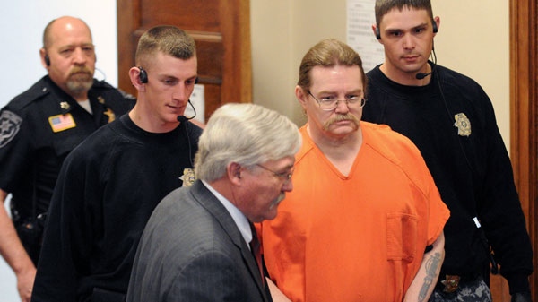 Convicted murderer Ronald Smith is escorted in for his clemency hearing at Powell County District Court in Deer Lodge, Montana, Wednesday, May 2, 2012. (The Missoulian, Michael Gallacher)