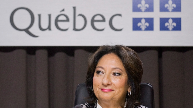 Justice France Charbonneau smiles as she sits on the opening day of a Quebec inquiry looking into allegations of corruption in the province's construction industry in Montreal, Tuesday, May 22, 2012. (Graham Hughes / THE CANADIAN PRESS)
