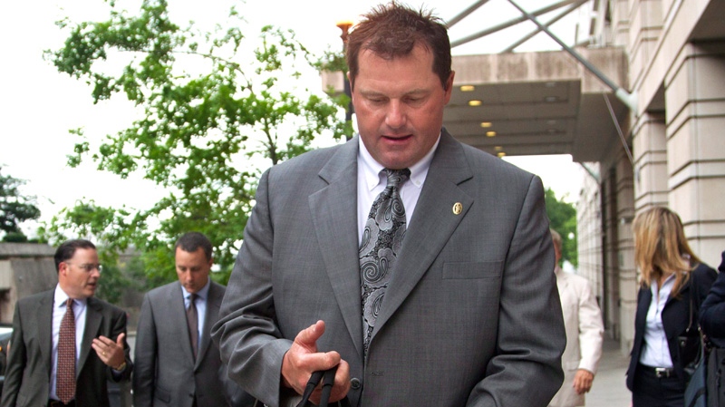 Former Major League Baseball pitcher Roger Clemens and his legal team leave federal court in Washington, Monday, May 21, 2012. (AP / Manuel Balce Ceneta