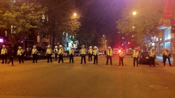A line of police officers block St. Denis St. just north of Sherbrooke St. (May 24, 2012)