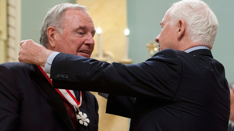 Gov.-Gen. David Johnston invests former prime minister Paul Martin as Companion of the Order of Canada during a ceremony in Ottawa, Friday May 25, 2012. (Adrian Wyld / THE CANADIAN PRESS)
