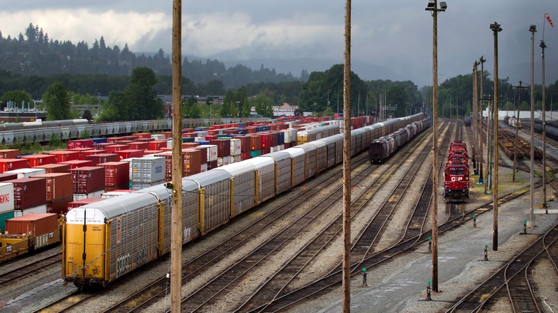 Canadian Pacific Rail locomotives and train cars sit idle at the company's Port Coquitlam yard east of Vancouver, B.C., Wednesday, May, 23, 2012. (Darryl Dyck / THE CANADIAN PRESS)