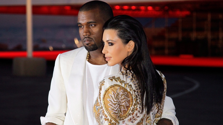 Kanye West and Kim Kardashian arrive for the screening of Cruel Summer at the 65th international film festival, in Cannes, southern France, Wednesday, May 23, 2012. (AP / Francois Mori)