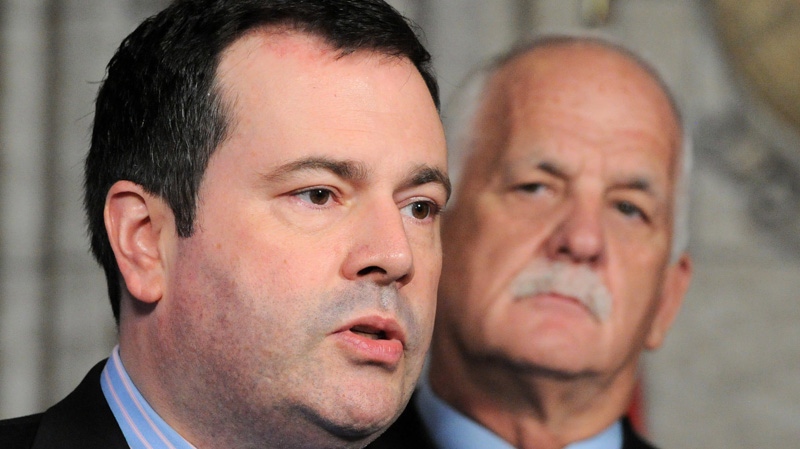 Vic Toews, Public Safety Minister, and Jason Kenney, Minister of Citizenship, make an announcement related to terrorism research funding during a press conference in the foyer of the House of Commons on Parliament Hill in Ottawa on Wednesday, May 30, 2012. (Sean Kilpatrick / THE CANADIAN PRESS)