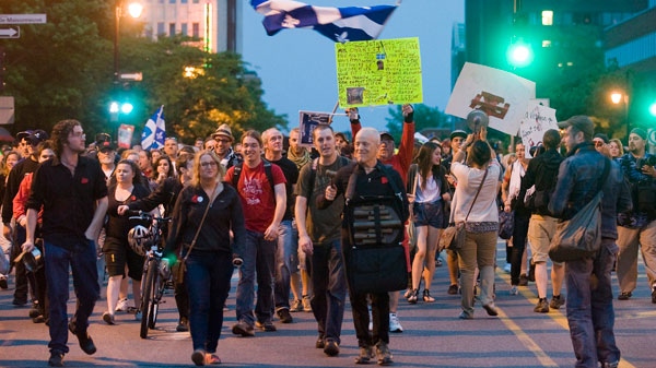 Protesters opposing Quebec student tuition fee hikes demonstrate in Montreal, Friday, June 1, 2012. (Graham Hughes / THE CANADIAN PRESS) 