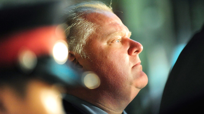 Toronto Mayor Rob Ford watches the activity outside the Eaton Centre in Toronto, Saturday, June 2, 2012. (Victor Biro / THE CANADIAN PRESS)