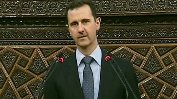 In a televised speech to parliament, Assad said his country is facing a 'real war' and blamed foreign-backed terrorists and extremists for the bloodshed.