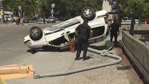 Police and emergency crews were called to the vehicle crash and rollover at Portage Avenue and Maryland Street in Winnipeg on June 5, 2012. 