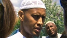 Imam Said Ragdeah speaks to reporters on Tuesday, June 5, 2012, after the funeral for Ahmed Hassan, the 24-year-old man killed in a shooting at Toronto's Eaton Centre over the weekend.