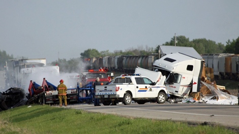 Emergency crews respond to a collision between two semi-trailers on Highway 16 east of Wynyard on Tuesday.