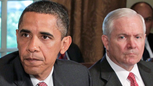 President Barack Obama, joined by Secretary of Defense Robert Gates at right, tells reporters during a Cabinet meeting that he thinks Gen. Stanley A. McChrystal, the commander of Western forces in Afghanistan, used "poor judgment" in speaking candidly during an interview with Rolling Stone magazine, in the Cabinet Room at the White House in Washington, June 22, 2010. Gen. McChrystal has been summoned to Washington to answer for the unflattering remarks about senior Obama Administration officials. (AP / J. Scott Applewhite)