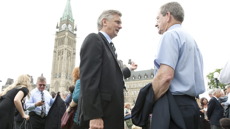 Senators, parliamentarians and their staff were evacuated from Parliament Buildings following a 5.5 magnitude earthquake in Ottawa, Wednesday, June 23, 2010. (Adrian Wyld / THE CANADIAN PRESS)  