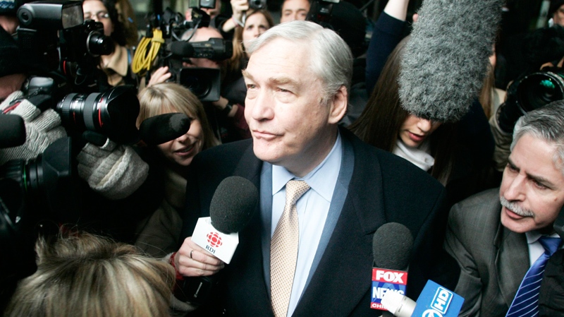 In this Dec. 10, 2007 photo, convicted newspaper baron Conrad Black leaves the federal building in Chicago. (AP / Jerry Lai)