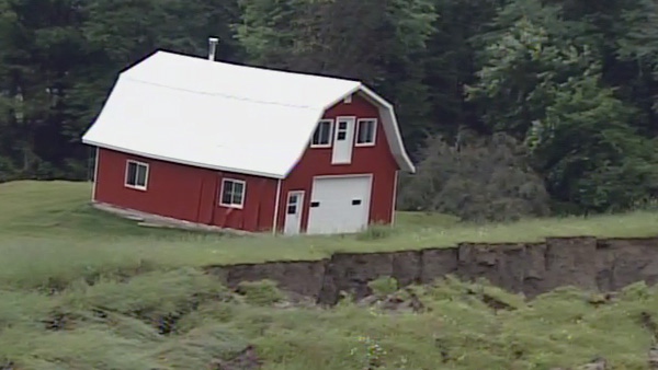 Jeff Carriere's barn slid 150 feet and was tilted askew following the quake.