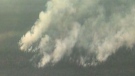 A forest fire near Cranberry Portage is spreading.