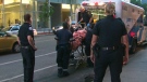A woman was taken to hospital after being hit by a bus near Davenport Road and Ossington Avenue Tuesday, June 12, 2012.