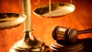 The scales of justice and a judge's gavel are pictured. (File)