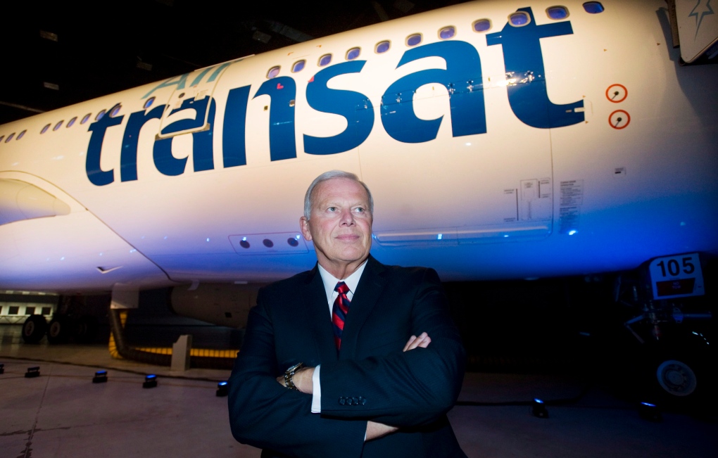 Air Transat CEO and president Allen Graham poses for a photograph next to an Airbus A330 during the 