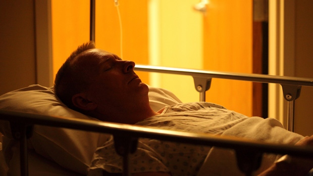 Patient in Hospital Bed