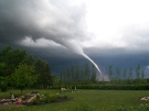 A tornado touches down near Biggar, Sask. in this undated file photo. (Credit: Cheryl and Corey Solanik)
