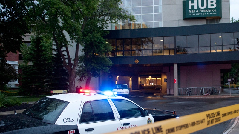 A police cruiser guards a crime scene after an attempted armed robbery left three people dead near the HUB Mall area on the campus of the University of Alberta in Edmonton on Friday, June 15, 2012. (Ian Jackson / THE CANADIAN PRESS)