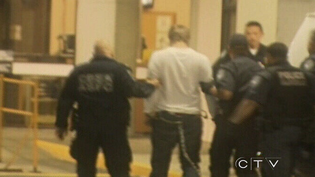CTV News has obtained video showing triple-murder suspect Travis Baumgartner taken into custody.