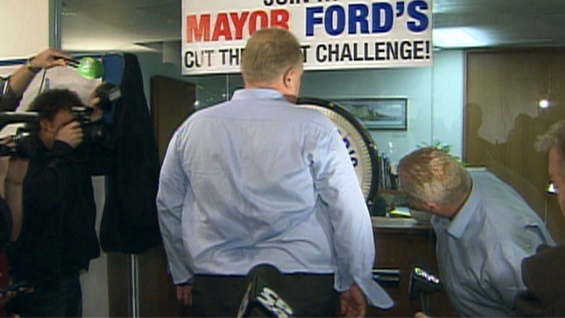 Mayor Rob Ford, centre, holds a weigh-in one week after starting a weight-loss challenge with city councillor Doug Ford, right, in Toronto, Monday, Jan. 23, 2012.