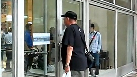 On the YouTube video, the man can be heard yelling outside the closed Eaton Centre doors, "We want to shop!"