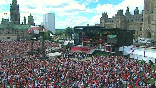 An aerial image taken from video shows the crowd gathered for Canada Day festivities as the Queen speaks on Parliament Hill in Ottawa, Thursday, July 1, 2010.