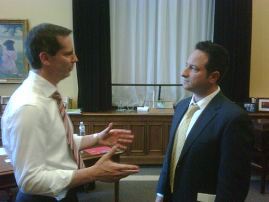 Ontario's Premier Dalton McGuinty (left) speaks with CTV Toronto's Paul Bliss at Queen's Park on Friday, July 2, 2010.